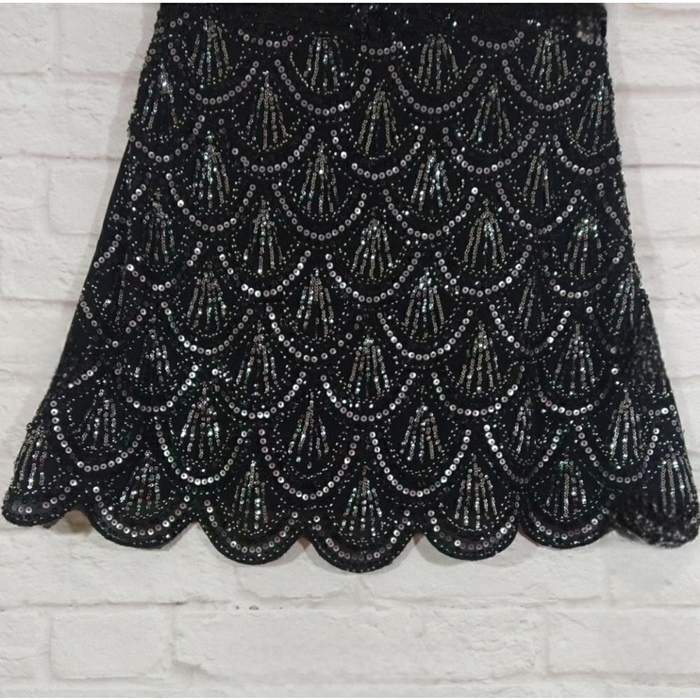 Black and silver sequin skirt size Medium. NWOT